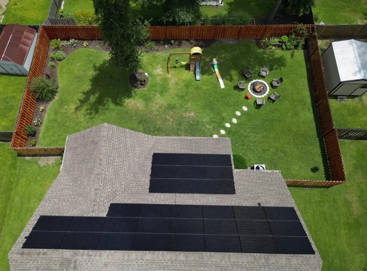 Modern two-story house with solar panels on roof
